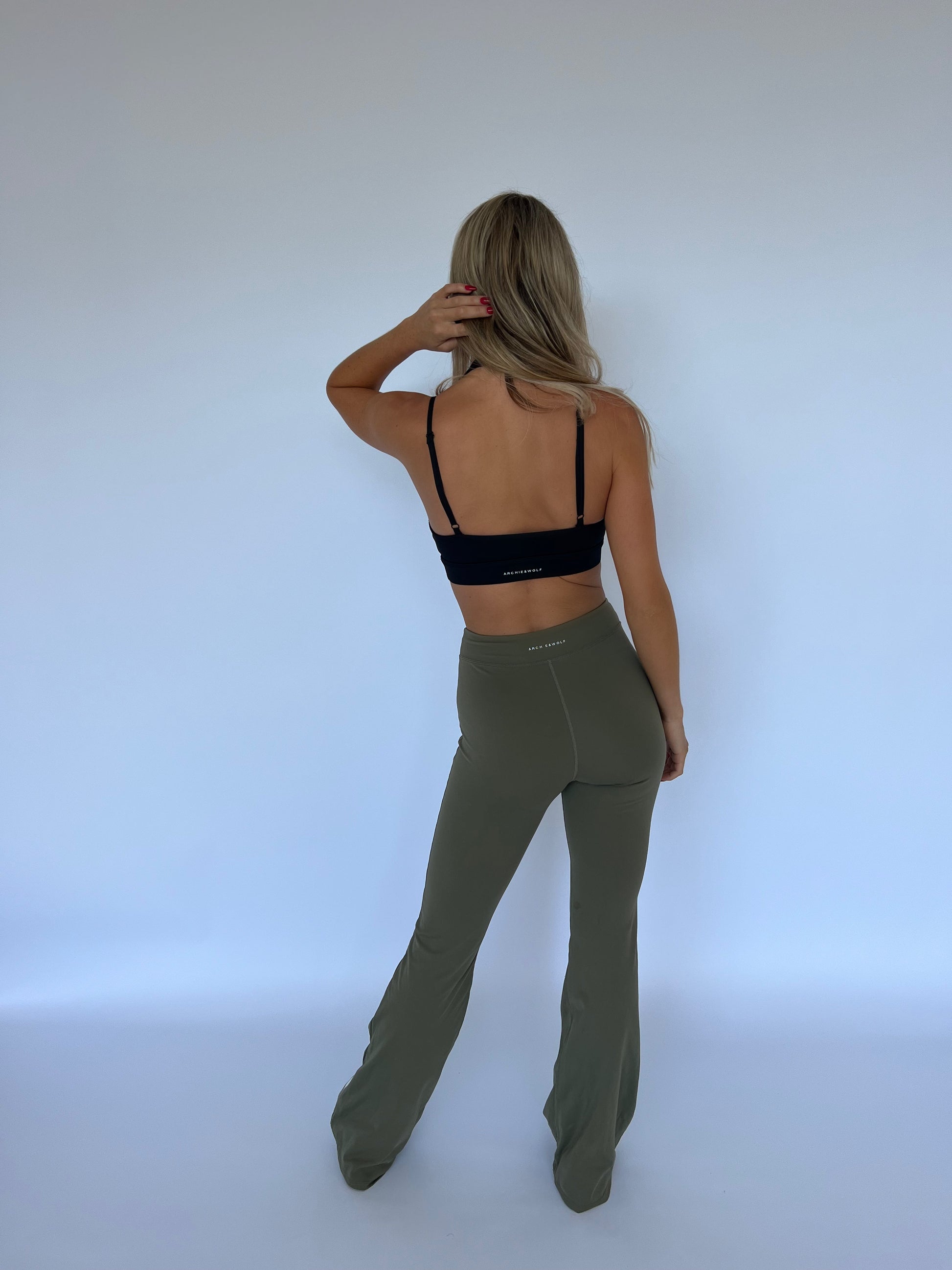 Model wearing Archie & Wolf Fiji Bra in Black